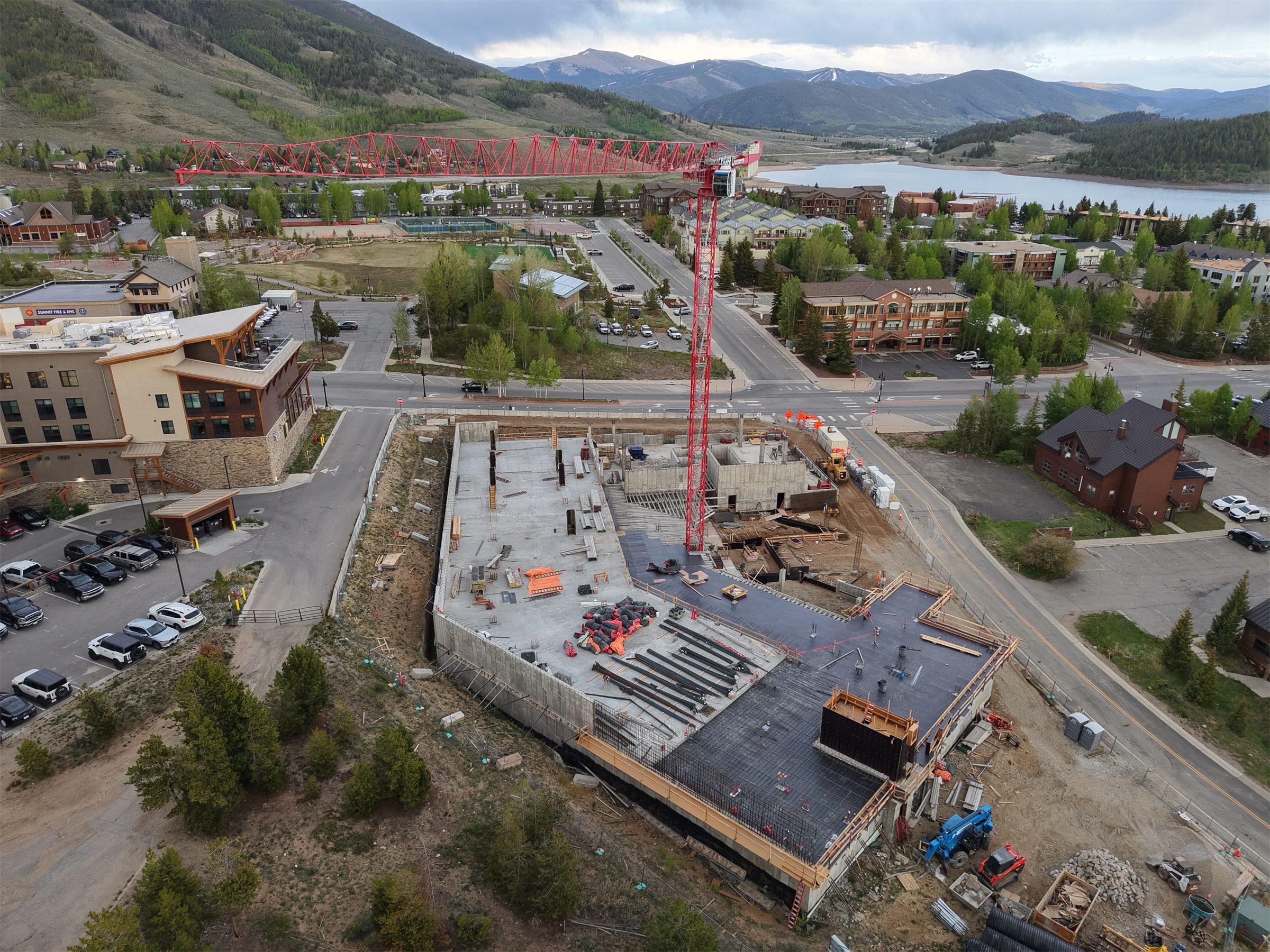 Aerial drone view of a tower crane on a construction site