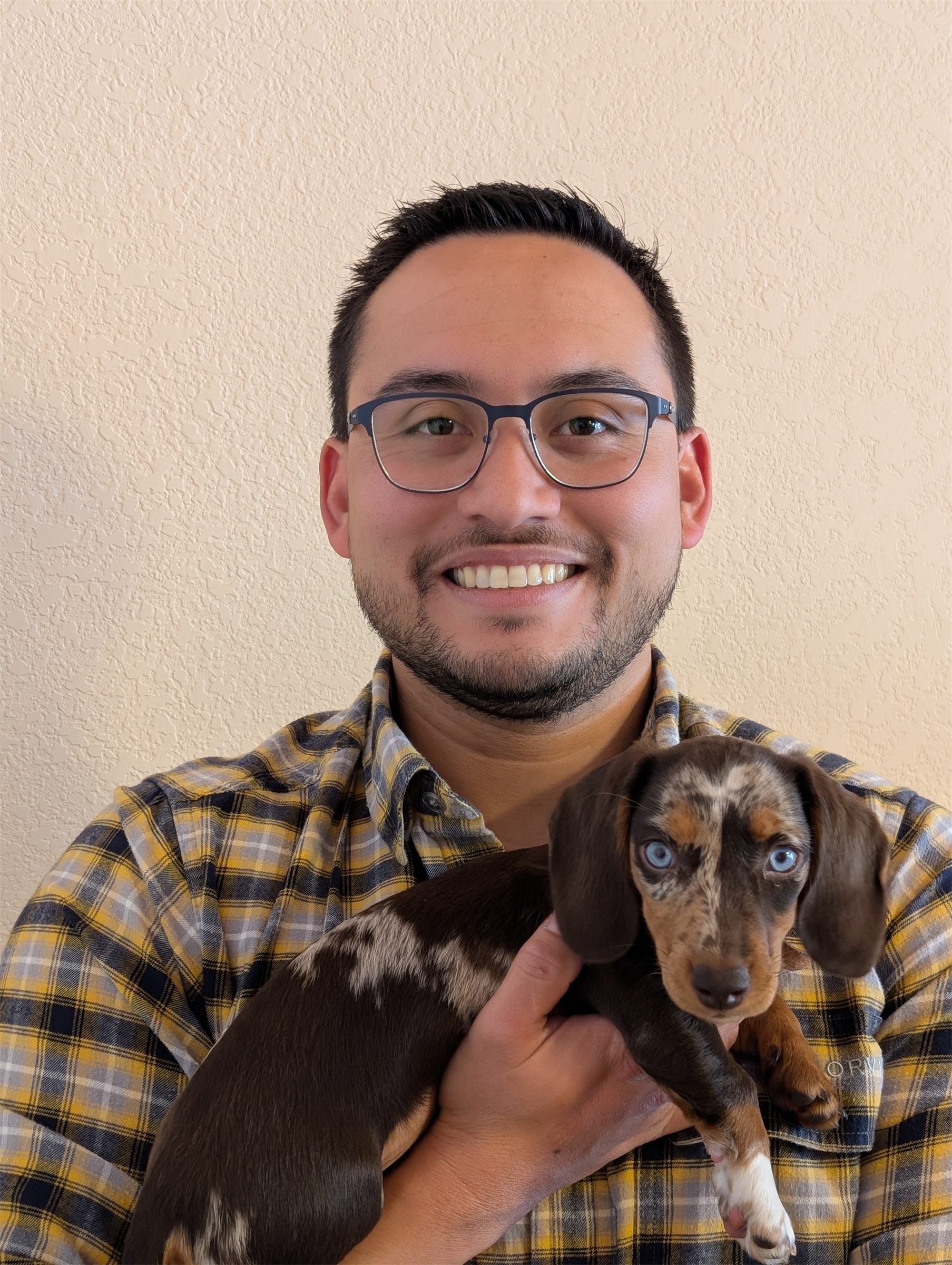 The operator of Ponderosa Pixels with his dog Mochi